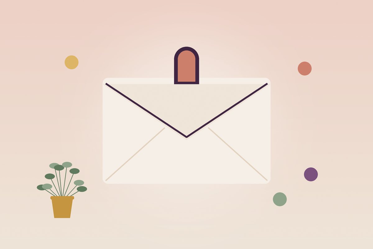 Envelope with an arched stamp and a small plant