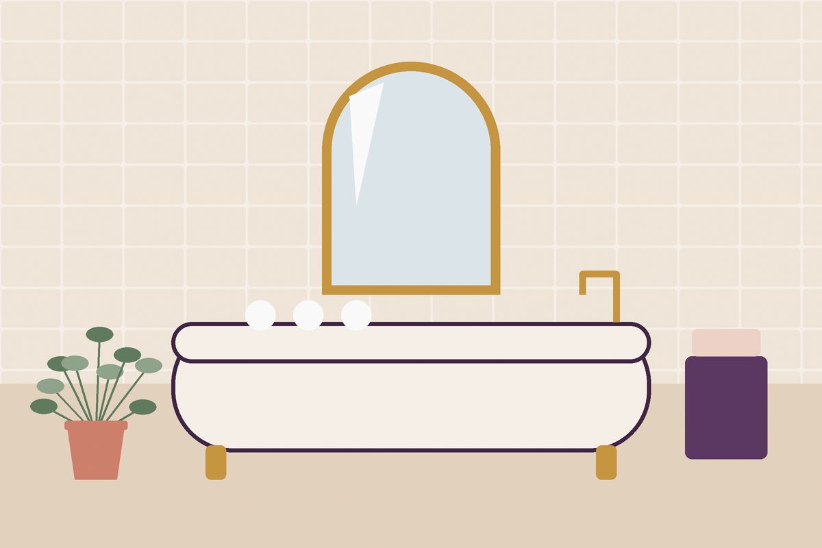 Bathroom with a freestanding tub, arched mirror and tiled walls